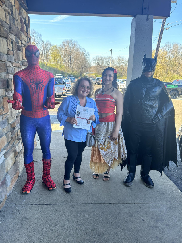 Madelyn with Superheroes and Moana