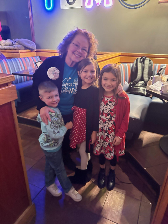 Madelyn with Kids at Wish Presentation